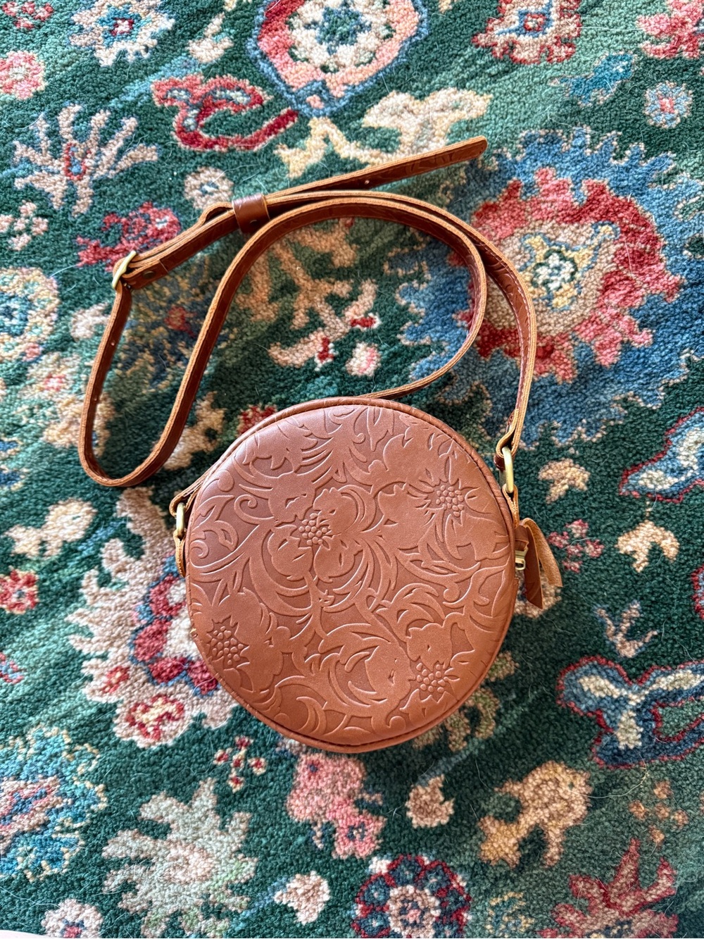 Portland Leather Embossed Round Crossbody Bag in Brown